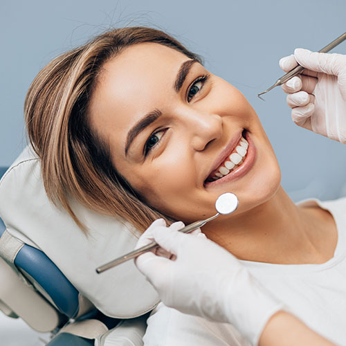 woman smiling at dentist