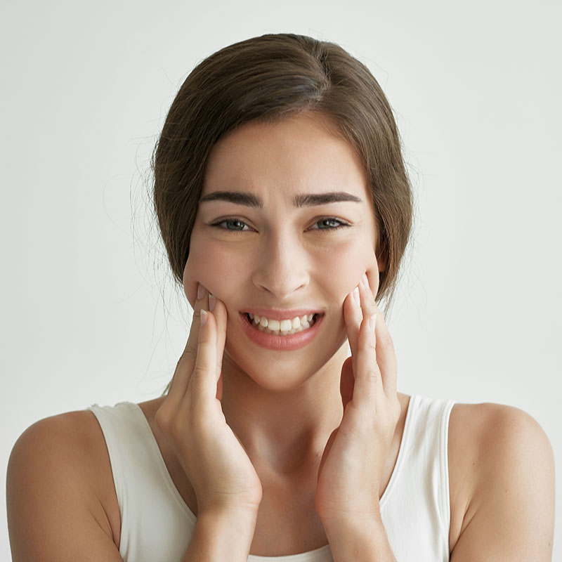 woman with jaw pain